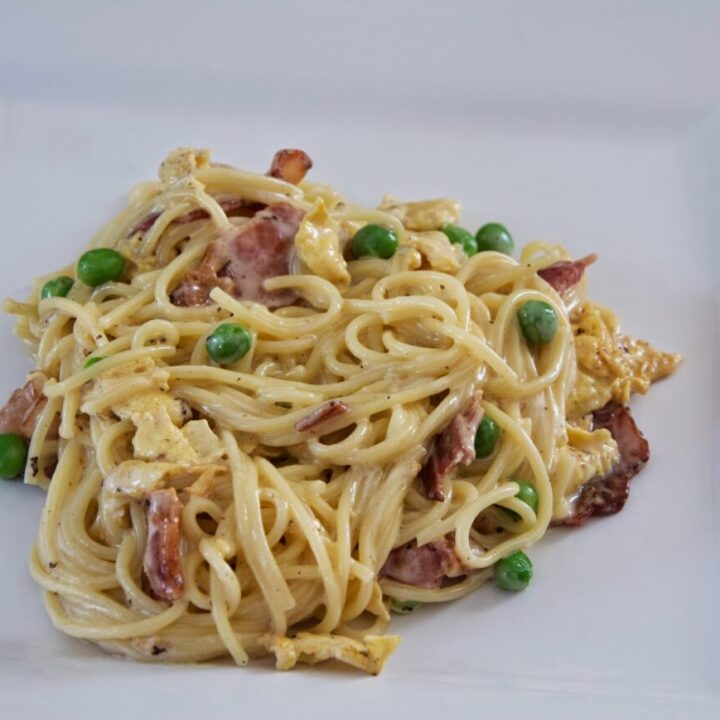 spaghetti carbonara on a white plate