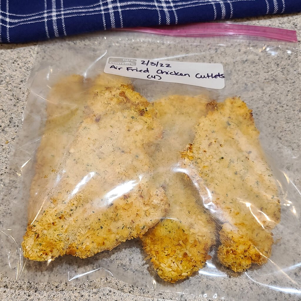 4 Air Fryer Chicken Cutlets in a Freezer Bag labelled Air Fried Chicken Cutlets (4)